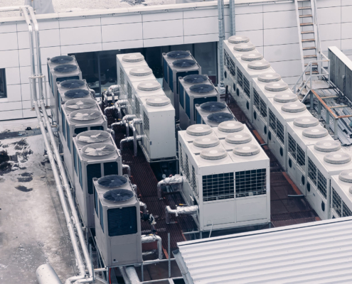 Aerial view of a large commercial HVAC system on a roof